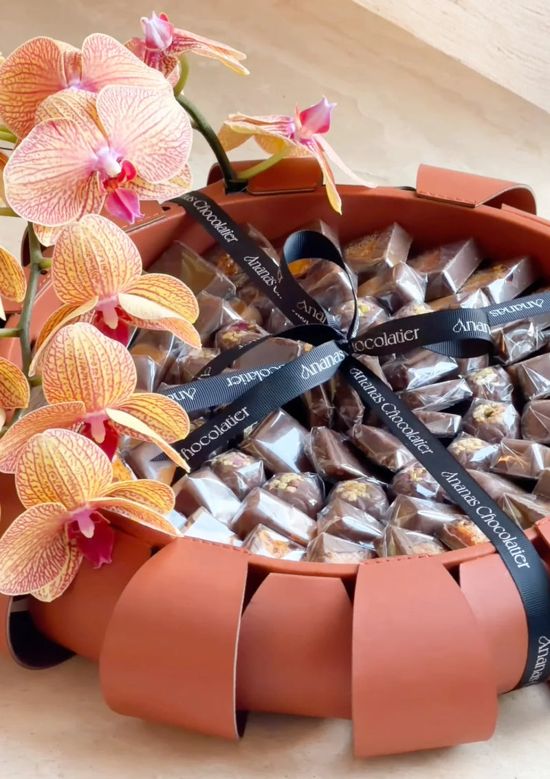 Amber Aura – Orchid & Chocolate Arrangement