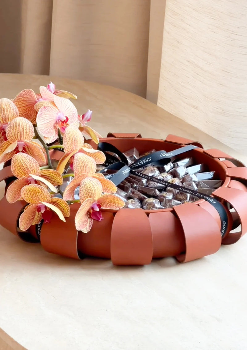 Amber Aura – Orchid & Chocolate Arrangement